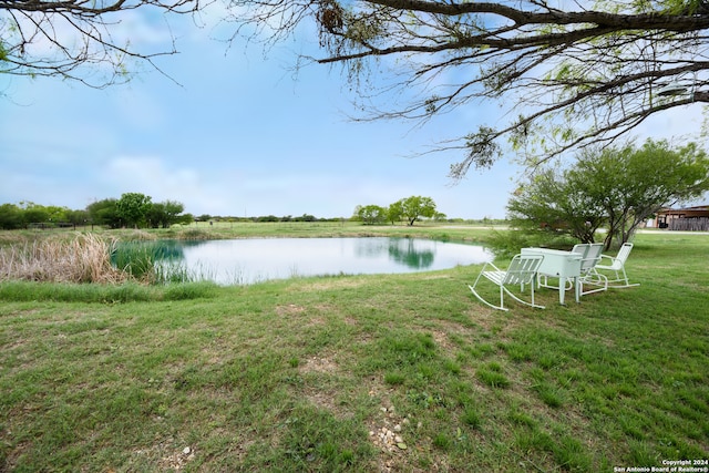 view of yard with a water view