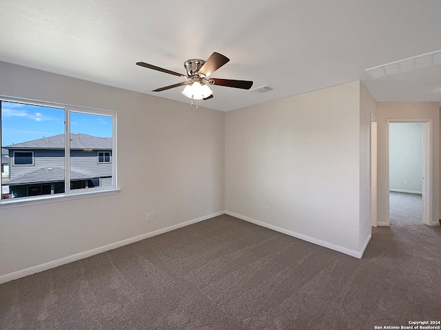 carpeted empty room with ceiling fan