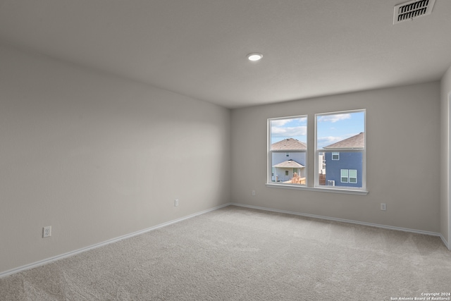 view of carpeted spare room