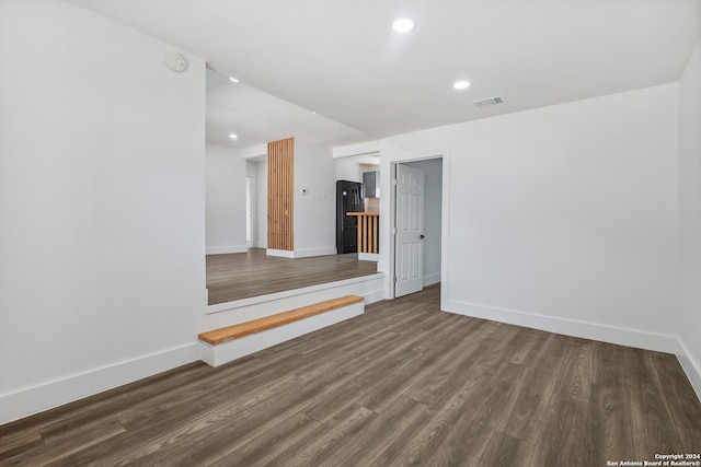 empty room featuring dark hardwood / wood-style floors