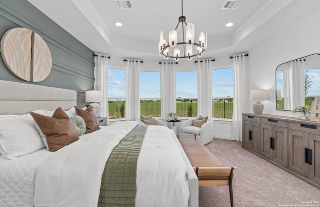 bedroom featuring light carpet, multiple windows, a raised ceiling, and crown molding