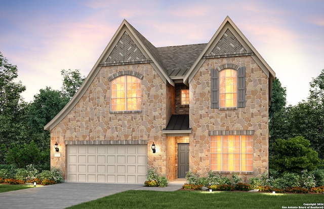 view of front of property featuring a garage