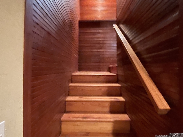 stairs with wooden walls