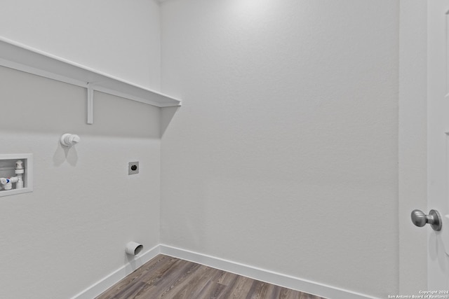 laundry room with hookup for an electric dryer, hookup for a washing machine, and dark hardwood / wood-style floors