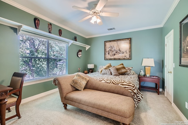 bedroom featuring ceiling fan, light carpet, and crown molding