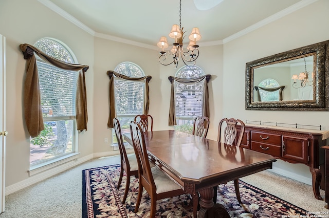 carpeted dining area with ornamental molding, a chandelier, and a wealth of natural light