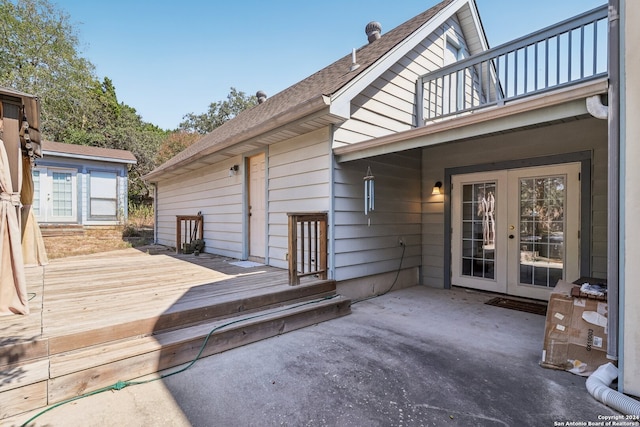 deck with french doors and a patio area