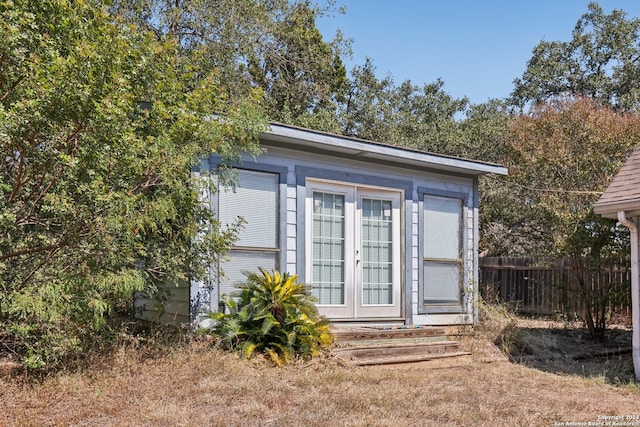 view of outbuilding with french doors