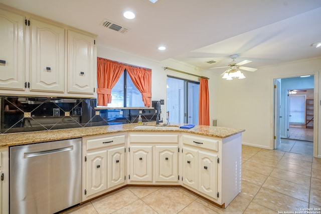 kitchen featuring kitchen peninsula, tasteful backsplash, stainless steel dishwasher, ceiling fan, and sink