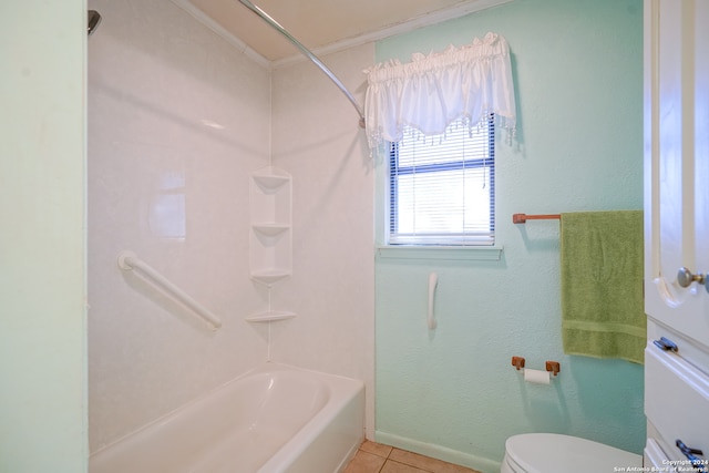 bathroom featuring tile patterned flooring, toilet, ornamental molding, and tub / shower combination