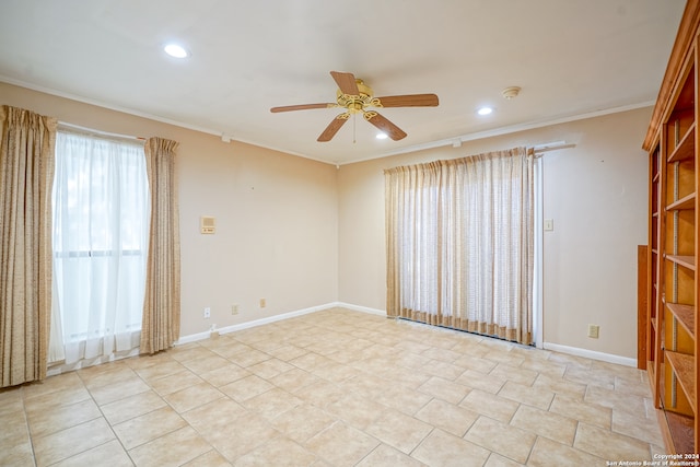 empty room with ceiling fan and ornamental molding