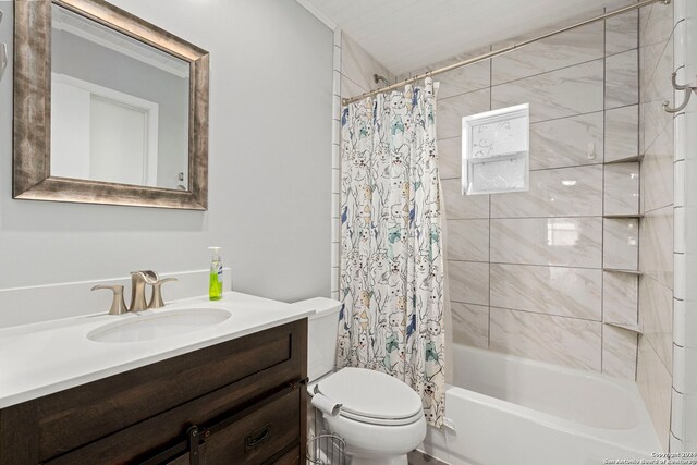 full bathroom featuring vanity, toilet, and shower / bathtub combination with curtain