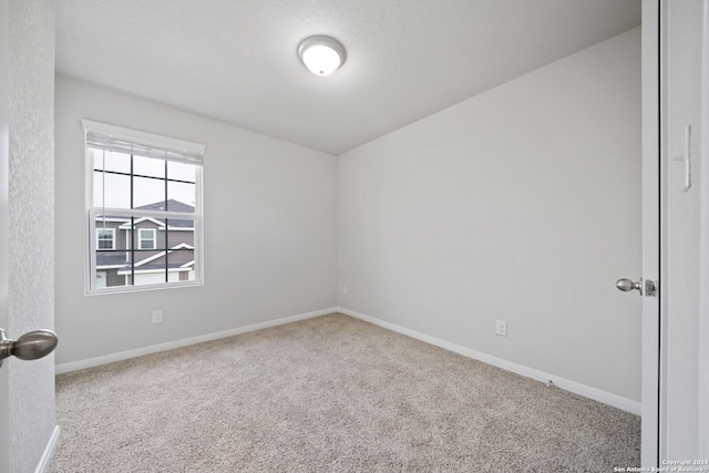 empty room with carpet floors