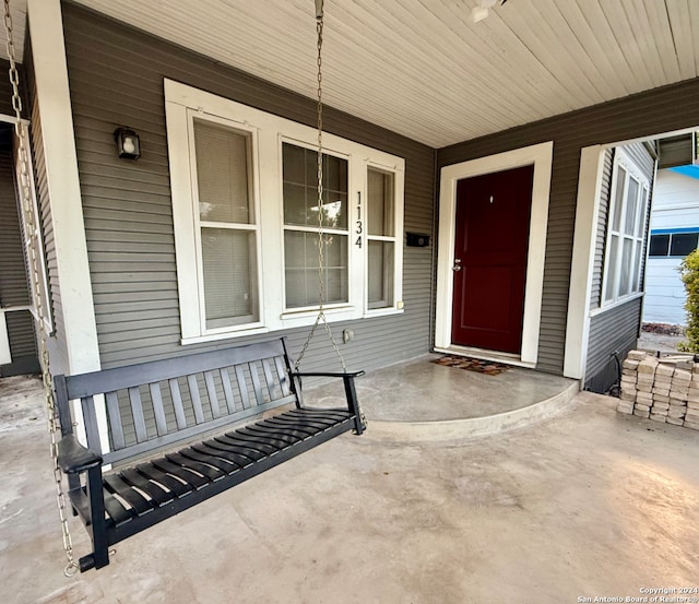 entrance to property with a porch