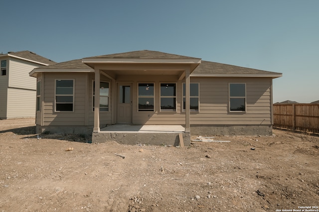 rear view of property featuring a patio