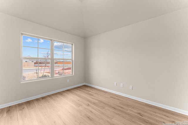 empty room with light hardwood / wood-style floors