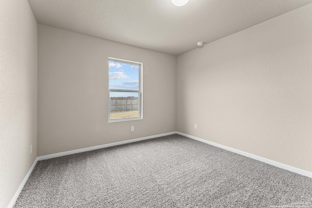 spare room featuring carpet flooring