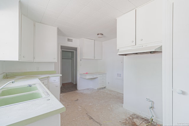 kitchen with white cabinets and sink