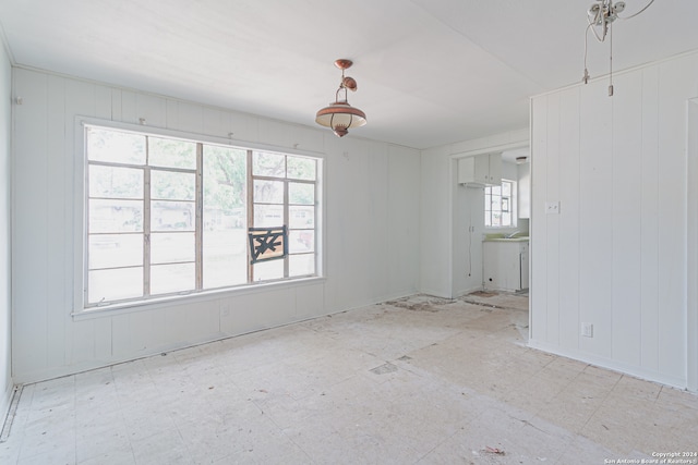 empty room featuring plenty of natural light