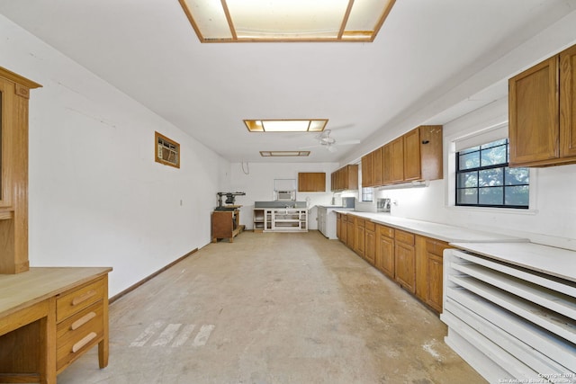 kitchen featuring ceiling fan