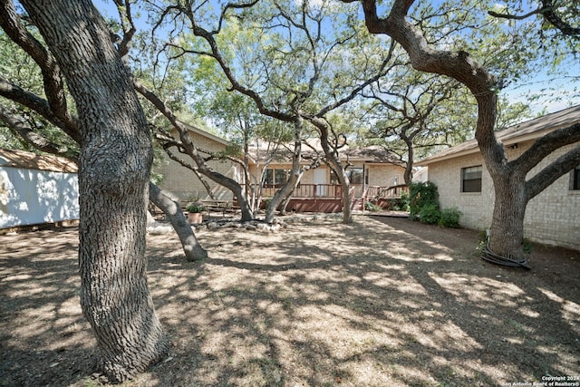 view of yard featuring a deck