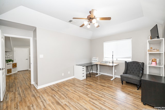 office featuring lofted ceiling, light wood-type flooring, and ceiling fan