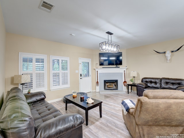 living room with light hardwood / wood-style flooring