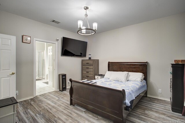 living room featuring light wood-type flooring and ceiling fan