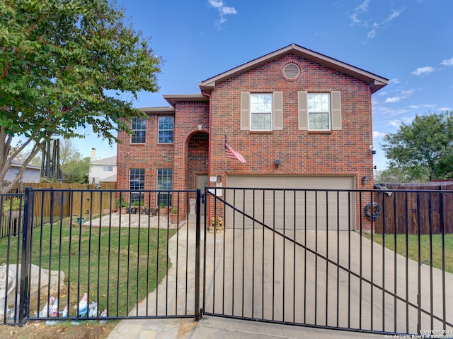 view of front facade featuring a front yard and a garage