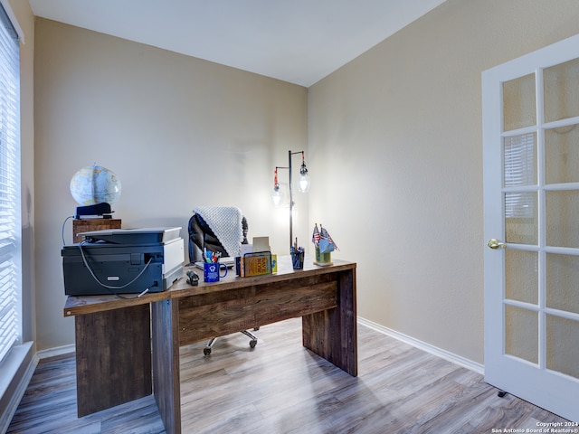 office with hardwood / wood-style floors