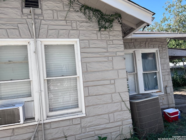 view of property exterior featuring central AC