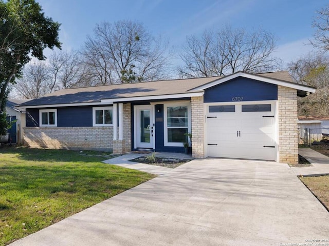 ranch-style home with a front lawn and a garage