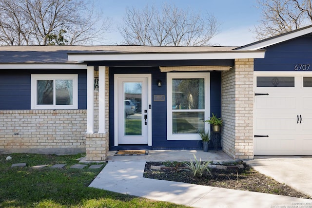 entrance to property with a garage