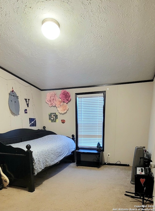 carpeted bedroom with lofted ceiling and a textured ceiling