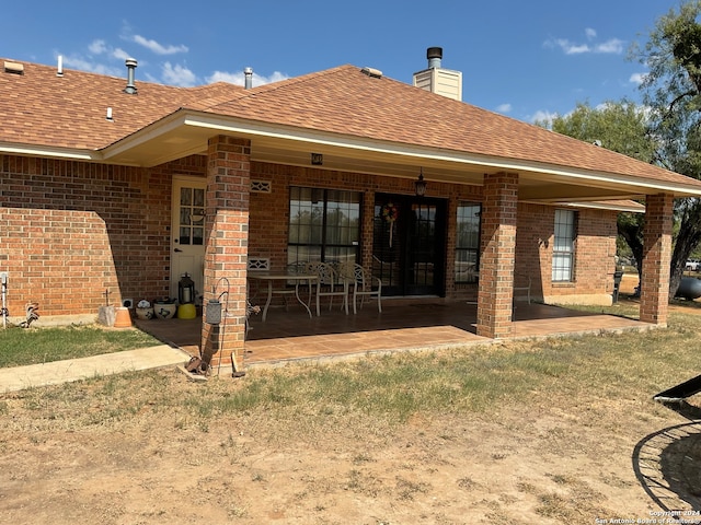 rear view of property with a patio