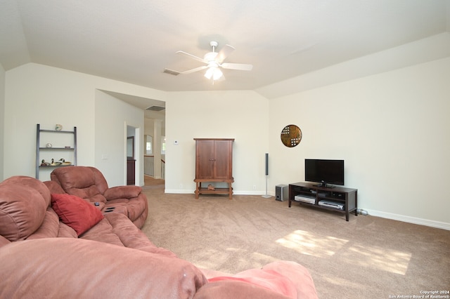 carpeted living room featuring ceiling fan and lofted ceiling