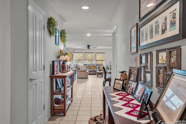 dining room with ceiling fan and light tile patterned flooring