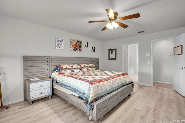 bedroom with ceiling fan and light hardwood / wood-style floors