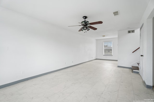 spare room featuring ceiling fan