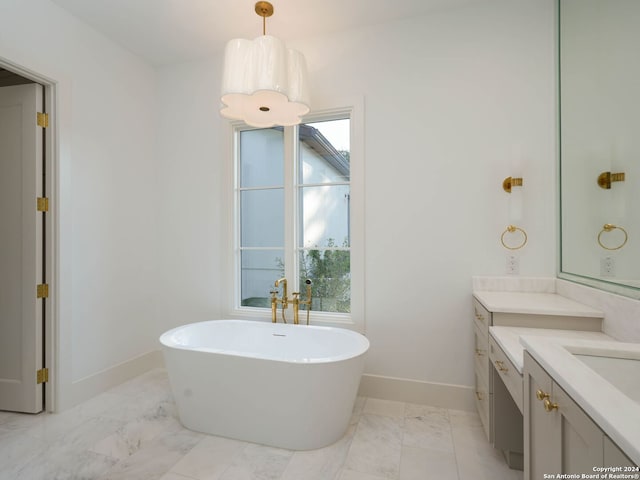 bathroom featuring vanity and a bathtub