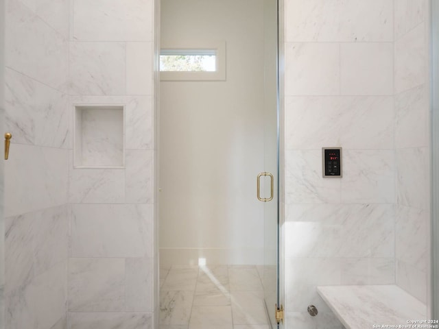 bathroom featuring walk in shower