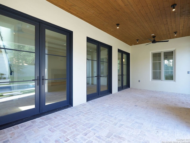 view of patio / terrace featuring french doors and ceiling fan