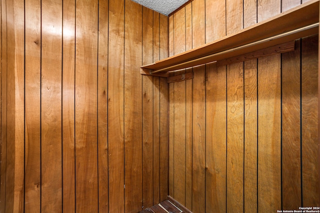 interior details featuring a textured ceiling