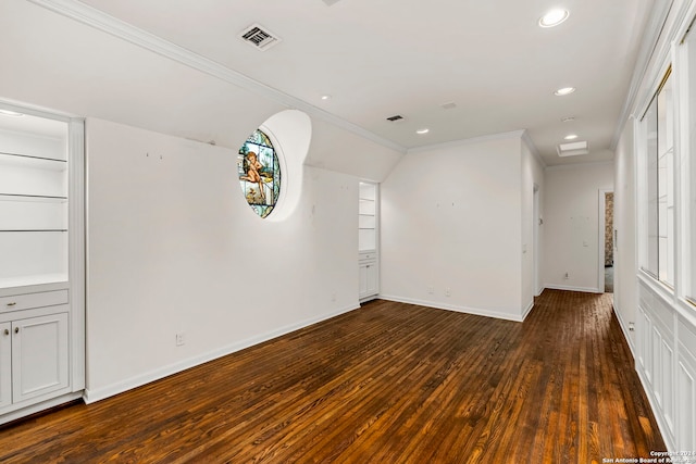 unfurnished room with crown molding, dark hardwood / wood-style floors, and plenty of natural light