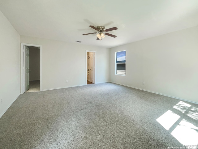 spare room with light carpet and ceiling fan