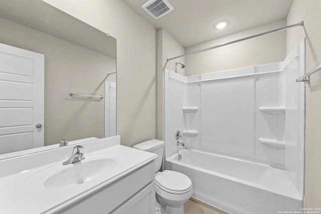 full bathroom featuring tile patterned floors, vanity, toilet, and bathtub / shower combination