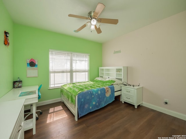 bedroom featuring dark hardwood / wood-style flooring and ceiling fan