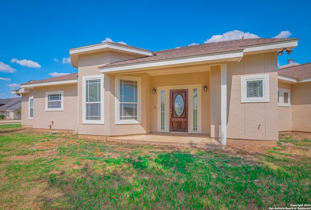 exterior space with a lawn