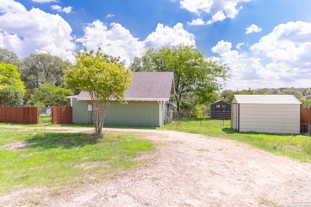 view of property exterior with a shed