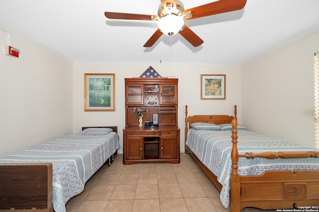 bedroom featuring crown molding, ceiling fan, and light tile patterned floors